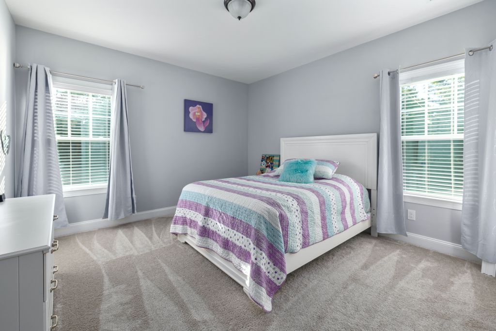 Bedroom of House 150 in North Isles